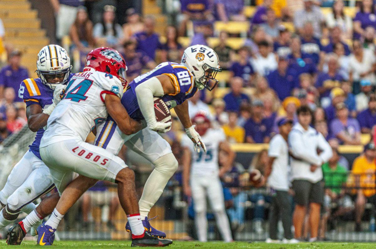 LSU football sophomore wide receiver Jack Bech (80) fights through the Lobos defense Saturday, Sept. 24, 2022, during LSU's 38-0 victory over New Mexico in Tiger Stadium.