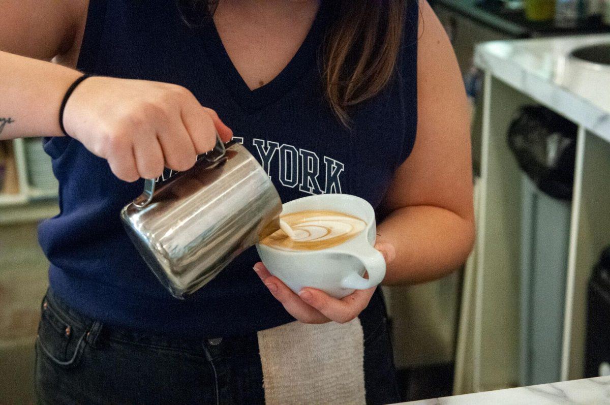 A barista carefully pours a hot latte&#160;on Sunday, Oct. 2, 2022,&#160;at Light House Coffee on Lee Drive in Baton Rouge, La.