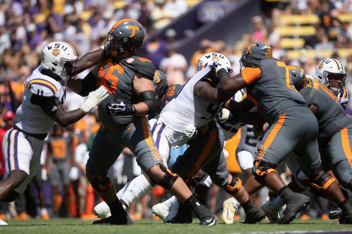 LSU senior defensive end Ali Gaye (11) and junior defensive tackle Jaquelin Roy (99) attempt to control the line of scrimmage on Saturday, Oct. 8, 2022, during LSU's defeat to Tennessee 13-40 in Tiger Stadium.