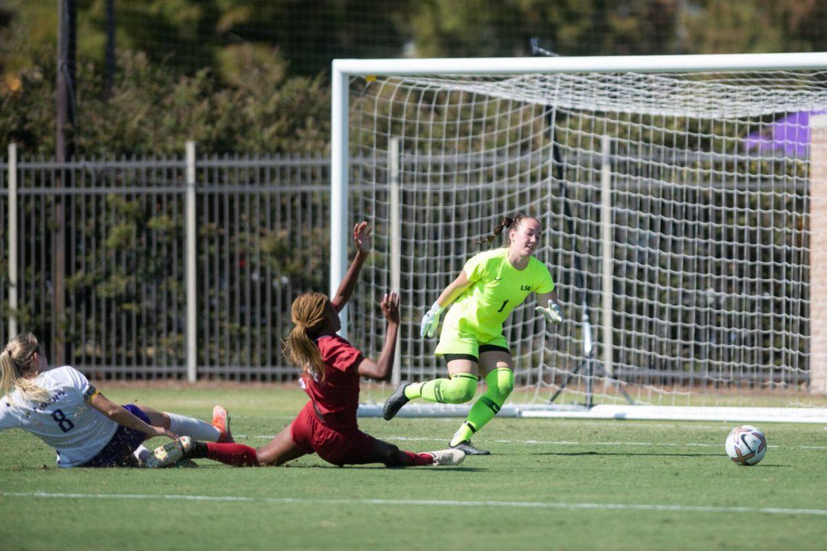 LSU soccer fifth-year defender Shannon Cooke (8) tackles an Alabama player in the box on Sunday, Oct. 9, 2022, during LSU&#8217;s defeat to Alabama 0-5 at LSU&#8217;s Soccer Stadium off Nicholson Drive.