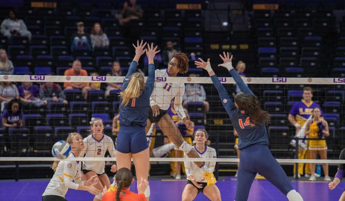 LSU volleyball senior middle blocker Anita Anwusi (11) stares at her opponents as she scores a point on Wednesday, Oct. 5, 2022, before their 3-2 victory over Auburn in the Pete Maravich Assembly Center on N. Stadium Drive.