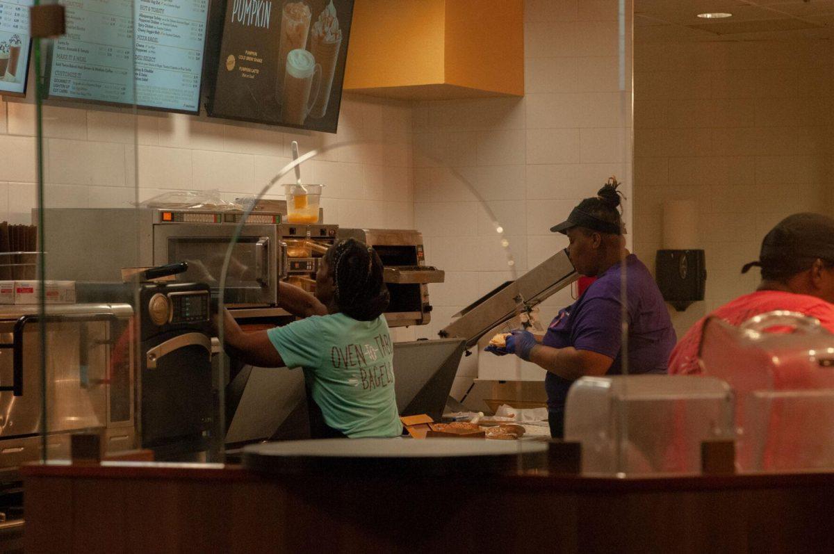 Employees at Einstein Bros. Bagel prepare food products on Thursday, Oct. 6, 2022, in the LSU Student Union on Highland Road in Baton Rouge, La.