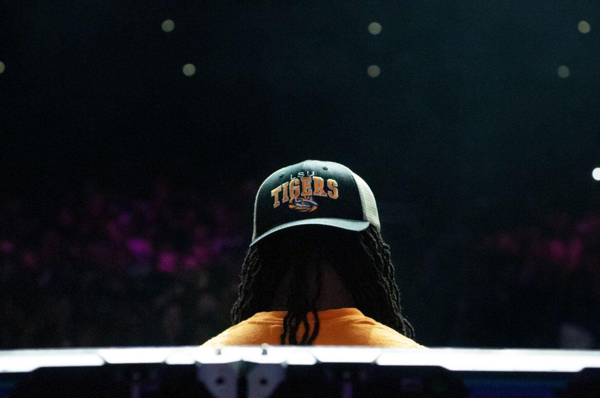 A member of the opening DJ set wears an LSU Tigers hat on Wednesday, Oct. 19, 2022, at LSU's homecoming concert at the PMAC on North Stadium Drive in Baton Rouge, La.