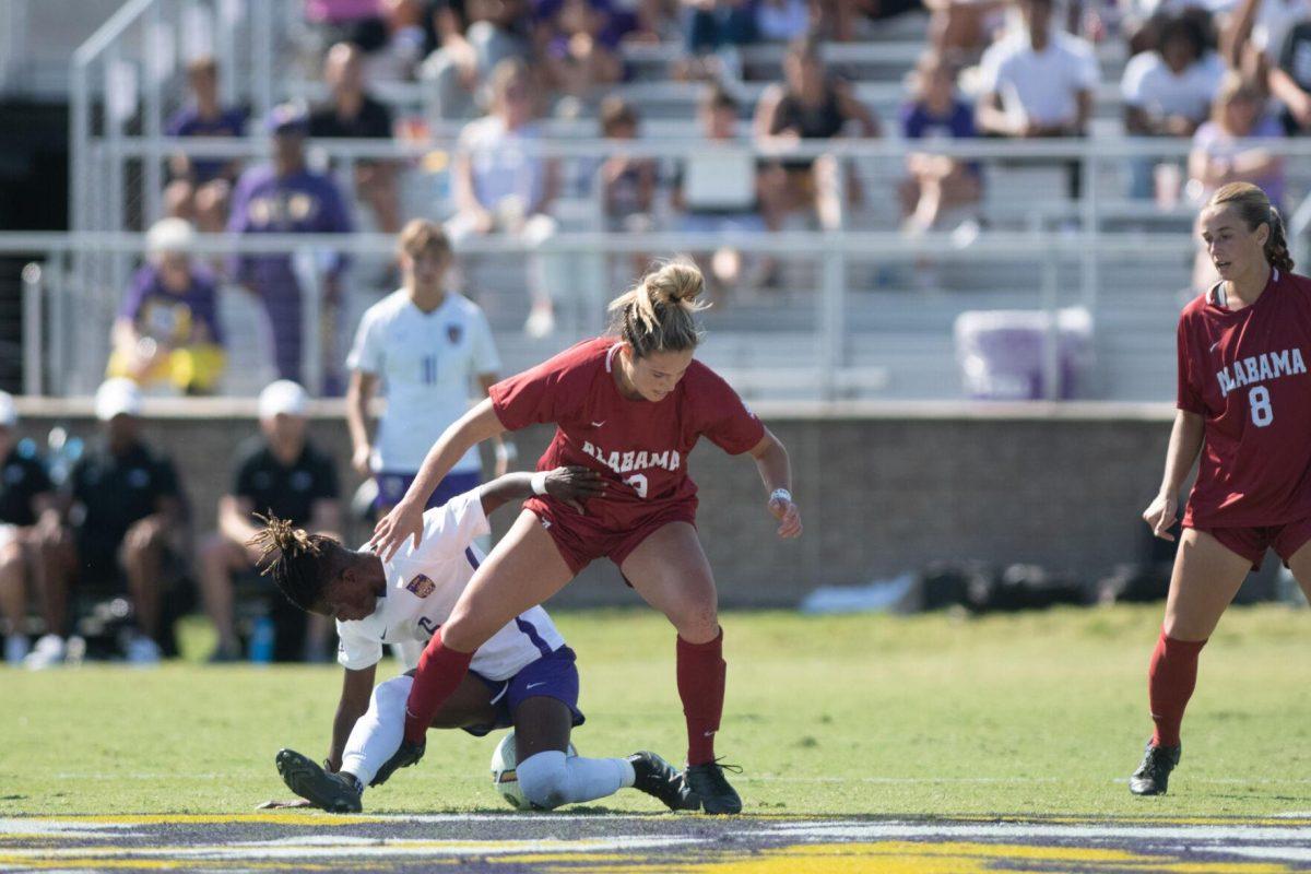 LSU soccer midfielder Wasila Diwura-Soale (6) falls while fighting for the ball on Sunday, Oct. 9, 2022, during LSU&#8217;s defeat to Alabama 0-5 at LSU&#8217;s Soccer Stadium off Nicholson Drive.