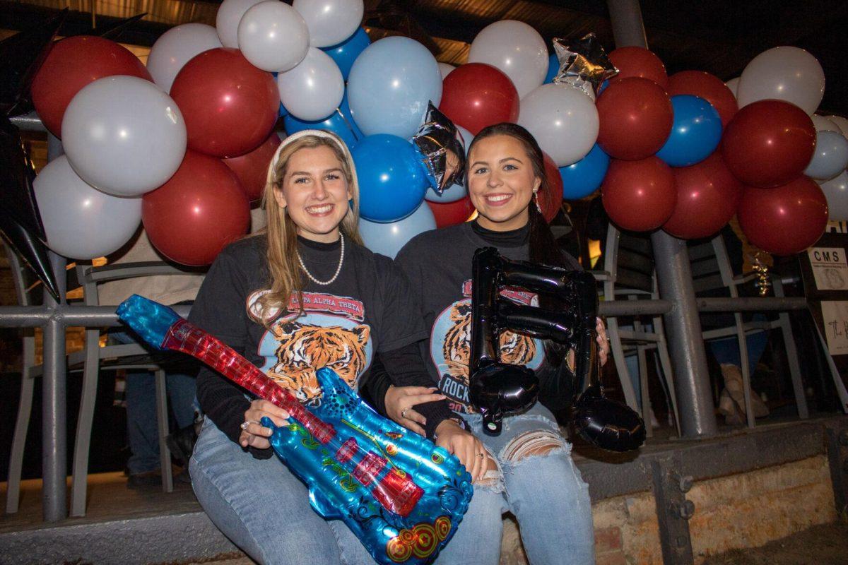 Kappa Alpha Theta's fundraising directors senior Karli Smith and junior Maddie Punch pose for a picture on Friday, Nov. 18, 2022, at Rock the CASA on Government Street in Baton Rouge, La.