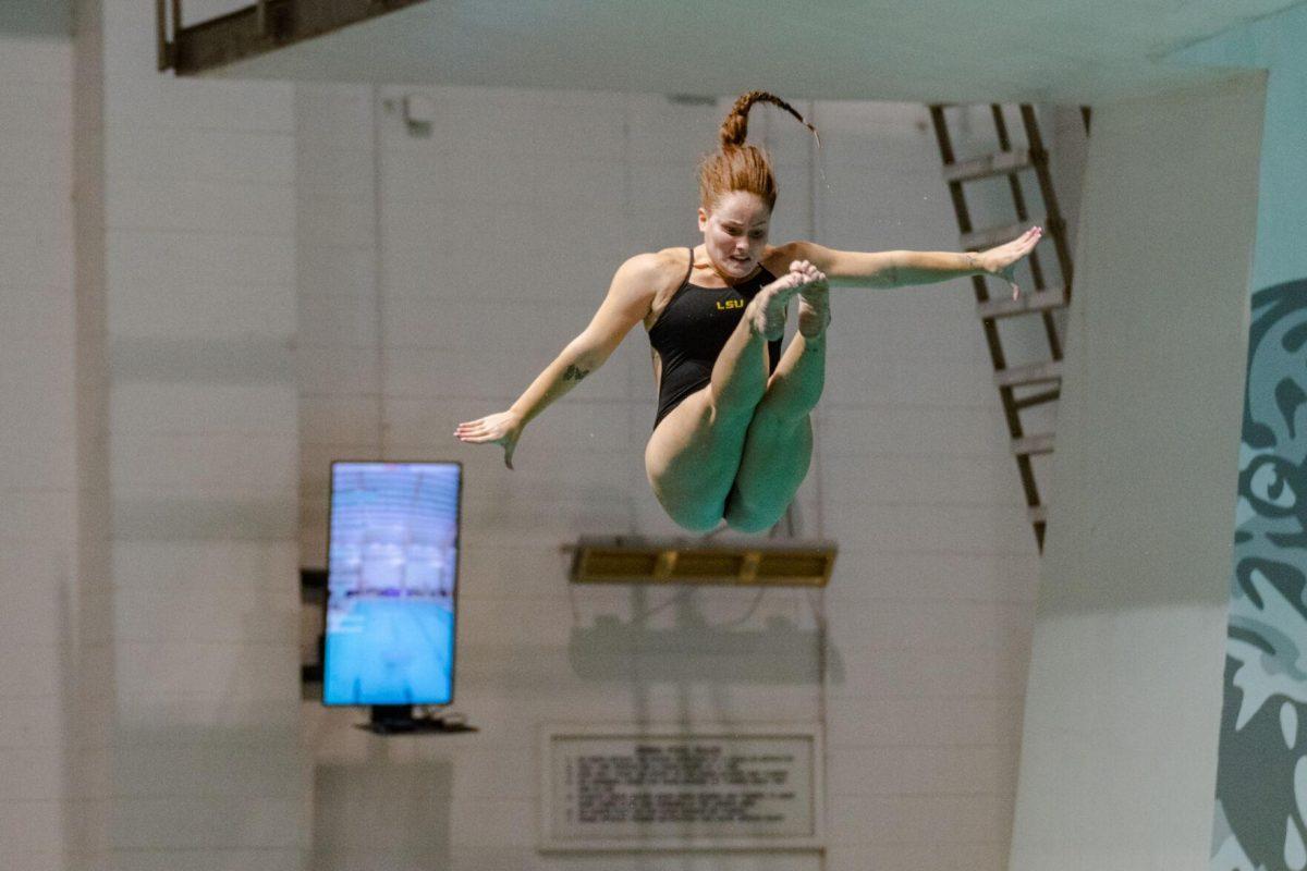 LSU diving sophomore Chiara Pellacani twists through the air on Friday, Nov. 4, 2022, during LSU&#8217;s win over Alabama at the LSU natatorium in Baton Rouge, La.