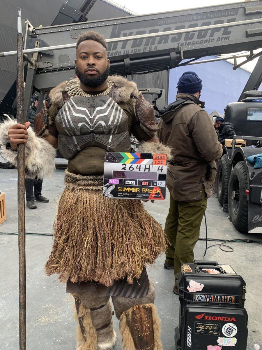 Floyd Anthony Johns Jr., an LSU political science alumnus, holds the slate while on set for "Black Panther: Wakanda Forever," which was released to theaters on Nov. 11, 2022.