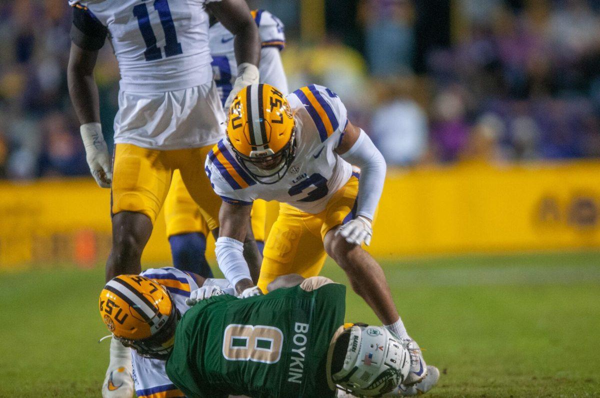 LSU football senior safety Greg Brooks Jr. (3) gets up after tackling UAB football player on Saturday, Nov. 19, 2022, during the LSU vs UAB game in Baton Rouge, La.