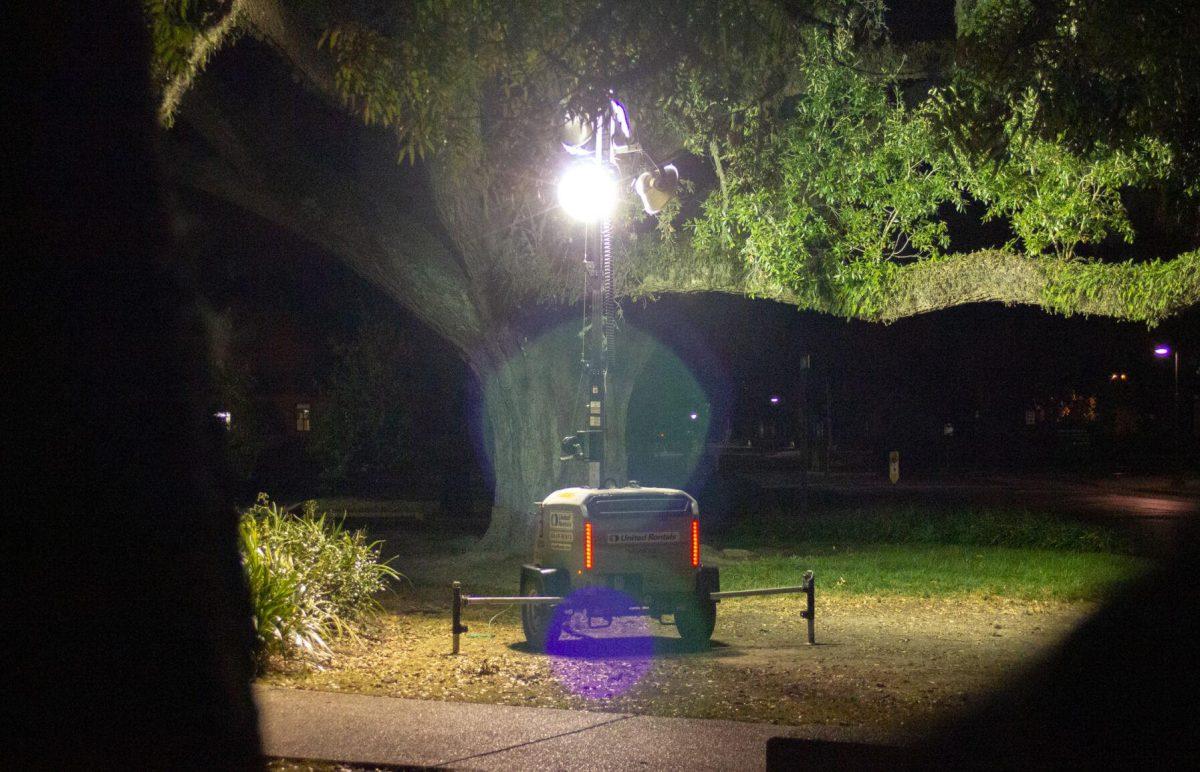 The tree is lit up by the light on Monday, Nov. 21, 2022, near the LSU Parade Ground in Baton Rouge, La.