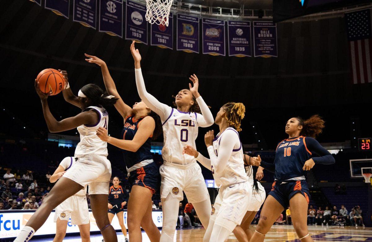 LSU women&#8217;s basketball freshman guard Flau&#8217;jae Johnson (4) grabs the rebound during LSU&#8217;s 121-46 win in an exhibition game against Langston University on Thursday, Nov. 3, 2022, in the Pete Maravich Assembly Center on N. Stadium Drive in Baton Rouge, La.