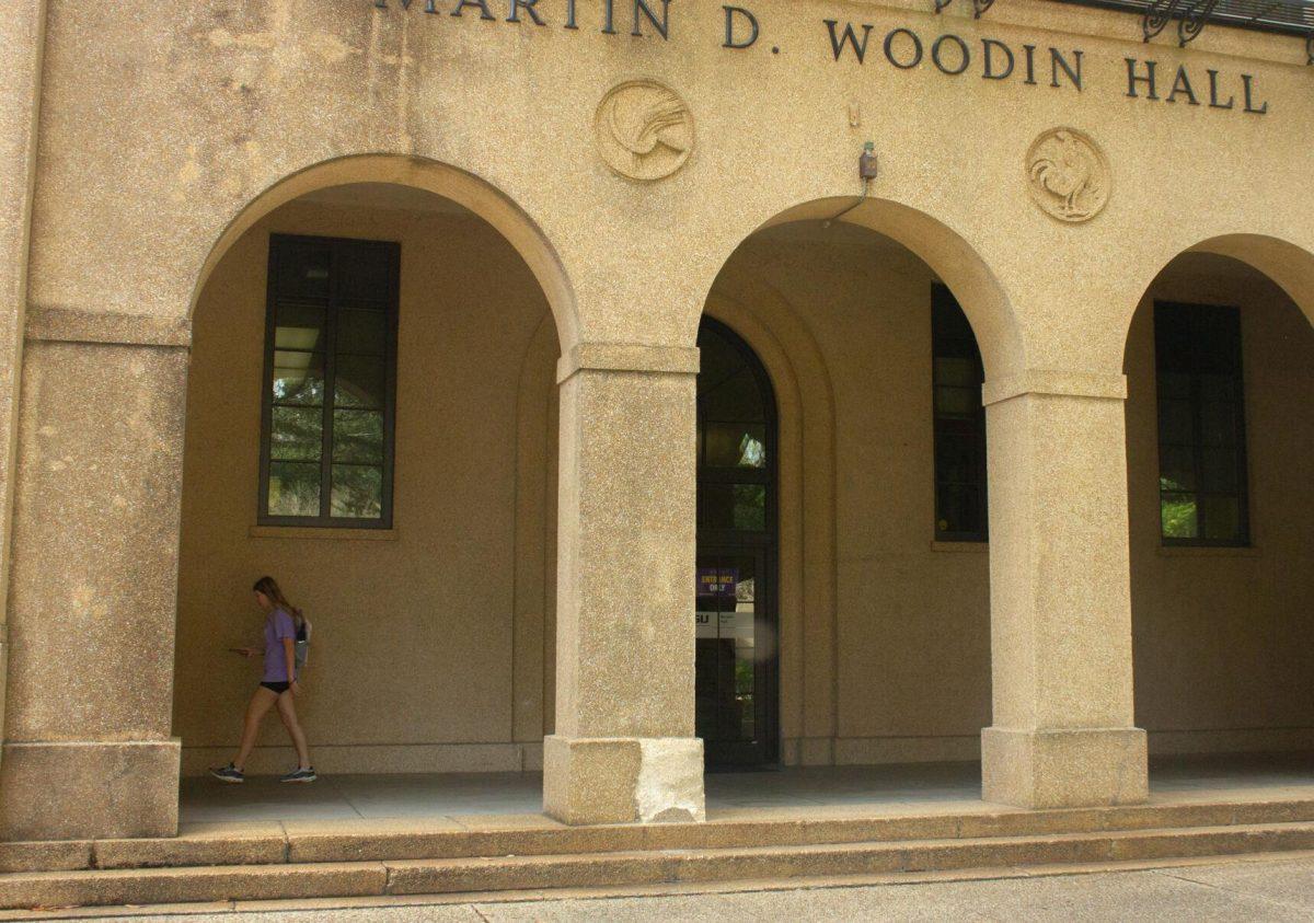 An LSU student sits in the archway on Monday, Nov. 7, 2022, in the Quad in Baton Rouge, La.