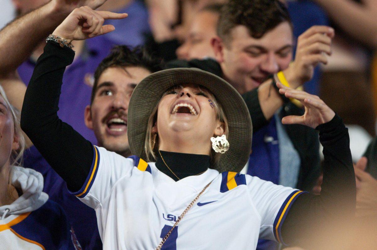 Caniac Maniac winner Maddie Tibbetts dances for the jumbotron on Saturday, Nov. 5, 2022, during LSU&#8217;s 32-31 victory over Alabama in Tiger Stadium in Baton Rouge, La.