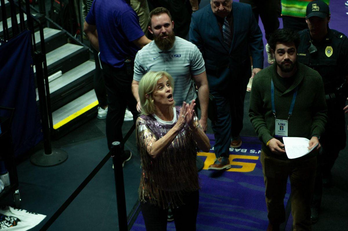 LSU women's basketball head coach Kim Mulkey cheers with fans while walking to the locker room after LSU's 111-41 victory over Mississippi Valley State on Friday, Nov. 11, 2022, at the Pete Maravich Assembly Center on N. Stadium Drive.