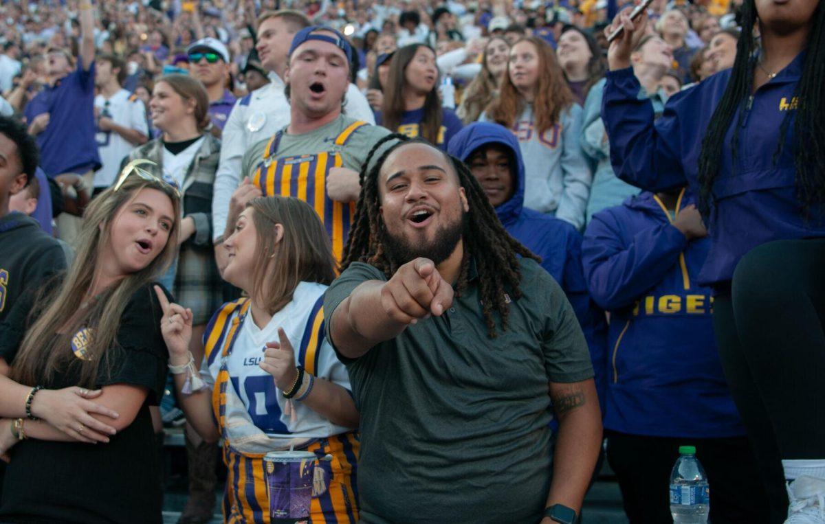 An LSU football fan sings to “Callin’ Baton Rouge” by Garth Brooks on Saturday, Nov. 5, 2022, before LSU’s 32-31 victory over Alabama in Tiger Stadium in Baton Rouge, La.