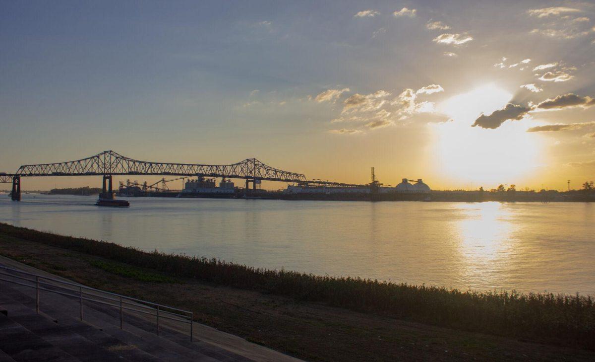 The sun shines over the water on Tuesday, Nov. 8, 2022, at the Mississippi River in Baton Rouge, La.