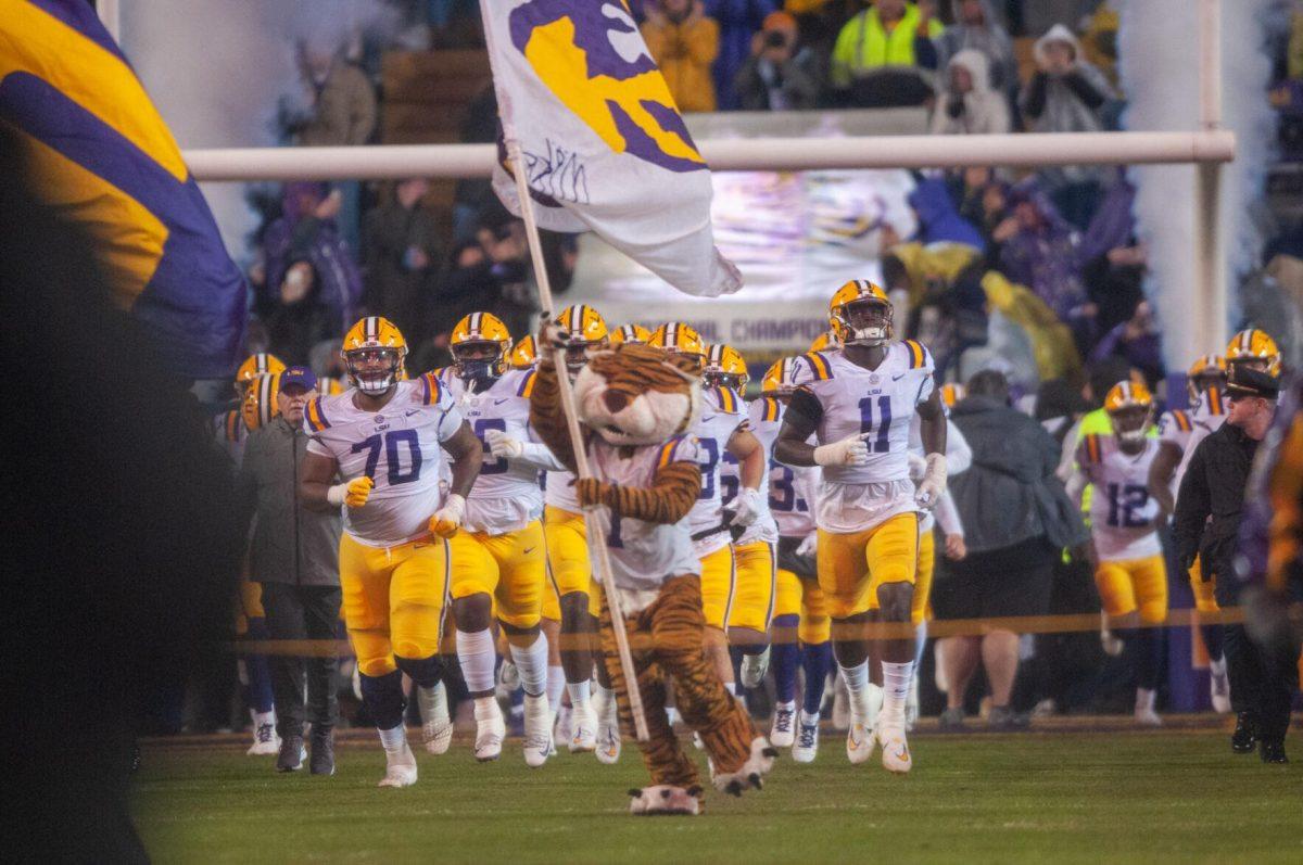 Mike the Tiger leads the LSU Football team onto the field on Saturday, Nov. 19, 2022, inside Tiger Stadium in Baton Rouge, La.