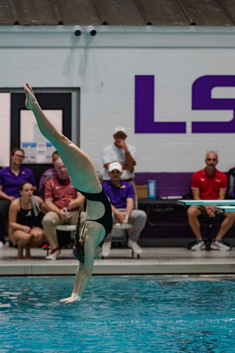 LSU diving sophomore Maggie Buckley nears the water on Friday, Nov. 4, 2022, during LSU&#8217;s win over Alabama at the LSU natatorium in Baton Rouge, La.