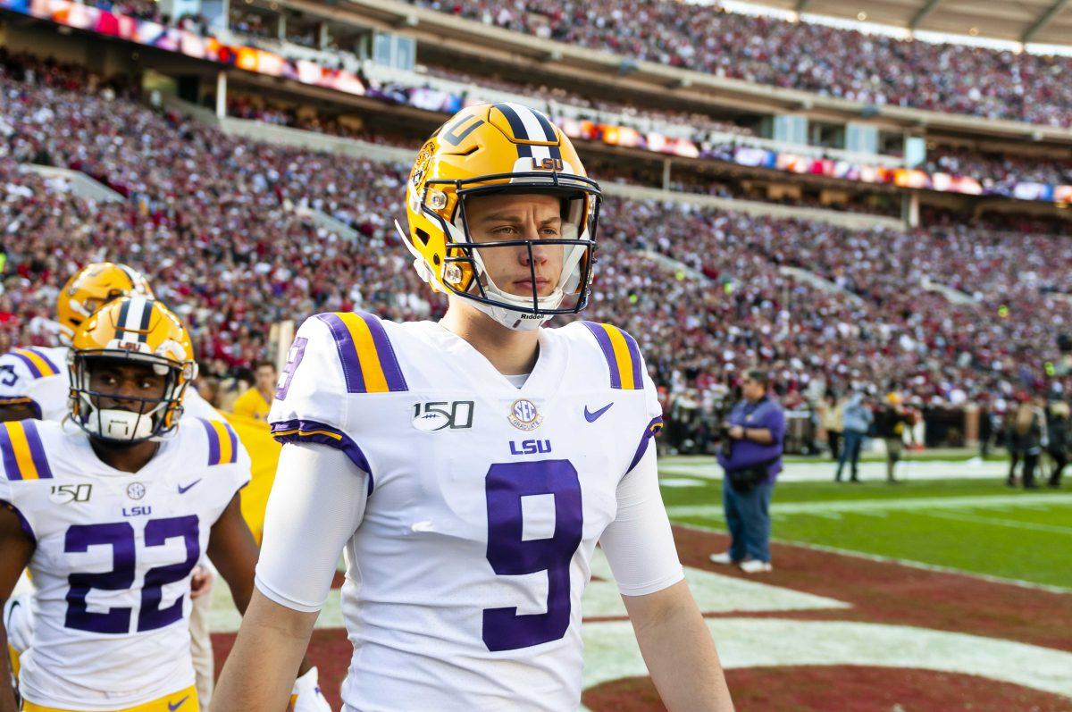 LSU senior quarterback Joe Burrow (9) enters the field during the Tigers' 46-41 victory over Alabama in Bryant-Denny Stadium on Saturday, Nov. 9, 2019.