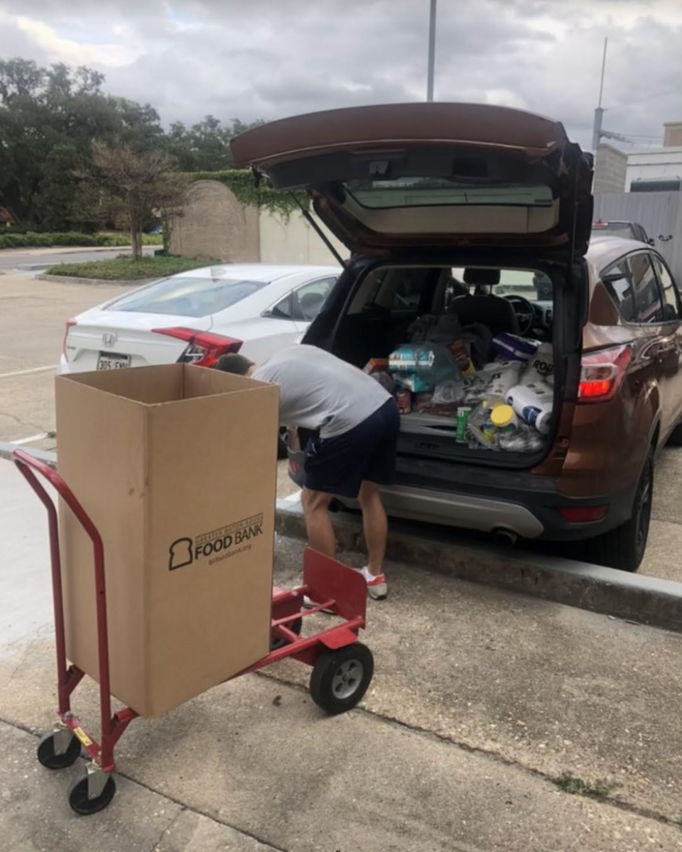 Psychology junior&#160;Patrick O'Neill unloading collected goods to store in the Military Science Building.&#160;