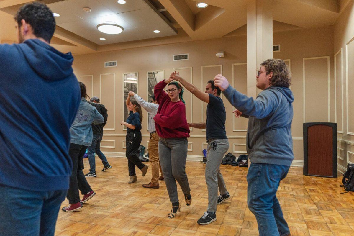 Dancers try a spin on Tuesday, Nov. 15, 2022, inside the LSU Student Union in Baton Rouge, La.