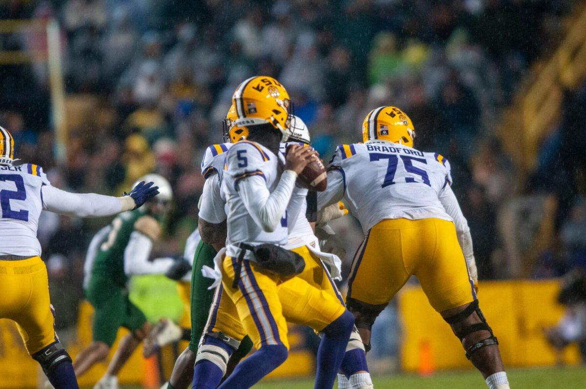 LSU football junior offensive lineman Anthony Bradford (75) defends the quarterback on Saturday, Nov. 19, 2022, during LSU's 41-10 win over UAB in Tiger Stadium in Baton Rouge, La.