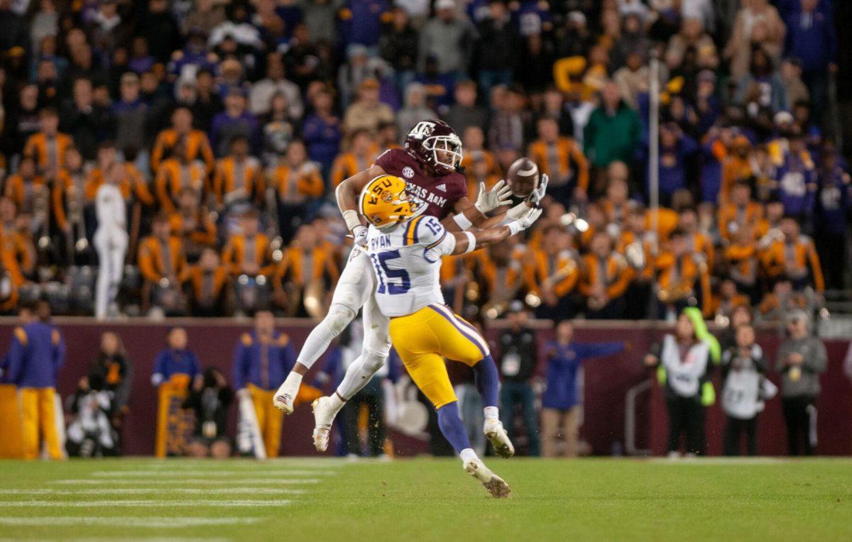 LSU football redshirt freshman Sage Ryan (15) attempts to intercept the ball on Saturday, Nov. 26, 2022, during LSU's 23-38 loss against Texas A&amp;M at Kyle Field.