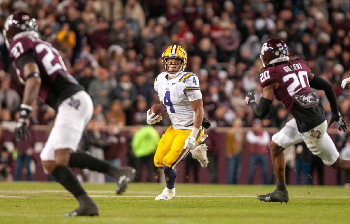 LSU football senior running back John Emery Jr. (4) glances at his opponent on Saturday, Nov. 26, 2022, during LSU's 23-38 loss against Texas A&amp;M at Kyle Field.