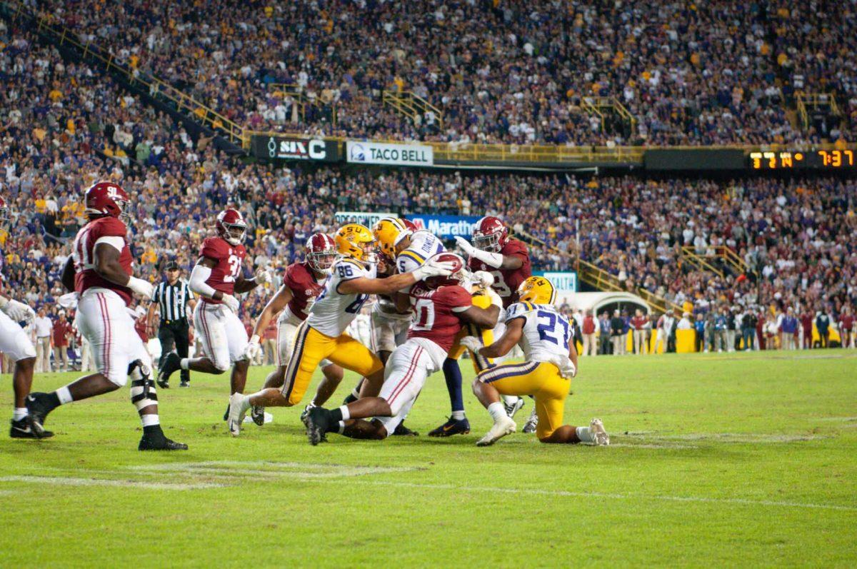 A play featuring (left to right) tight end Mason Taylor, quarterback Jayden Daniels, and running back Josh Williams on Saturday, Nov. 5, 2022, during LSU&#8217;s 32-31 victory over Alabama in Tiger Stadium in Baton Rouge, La.