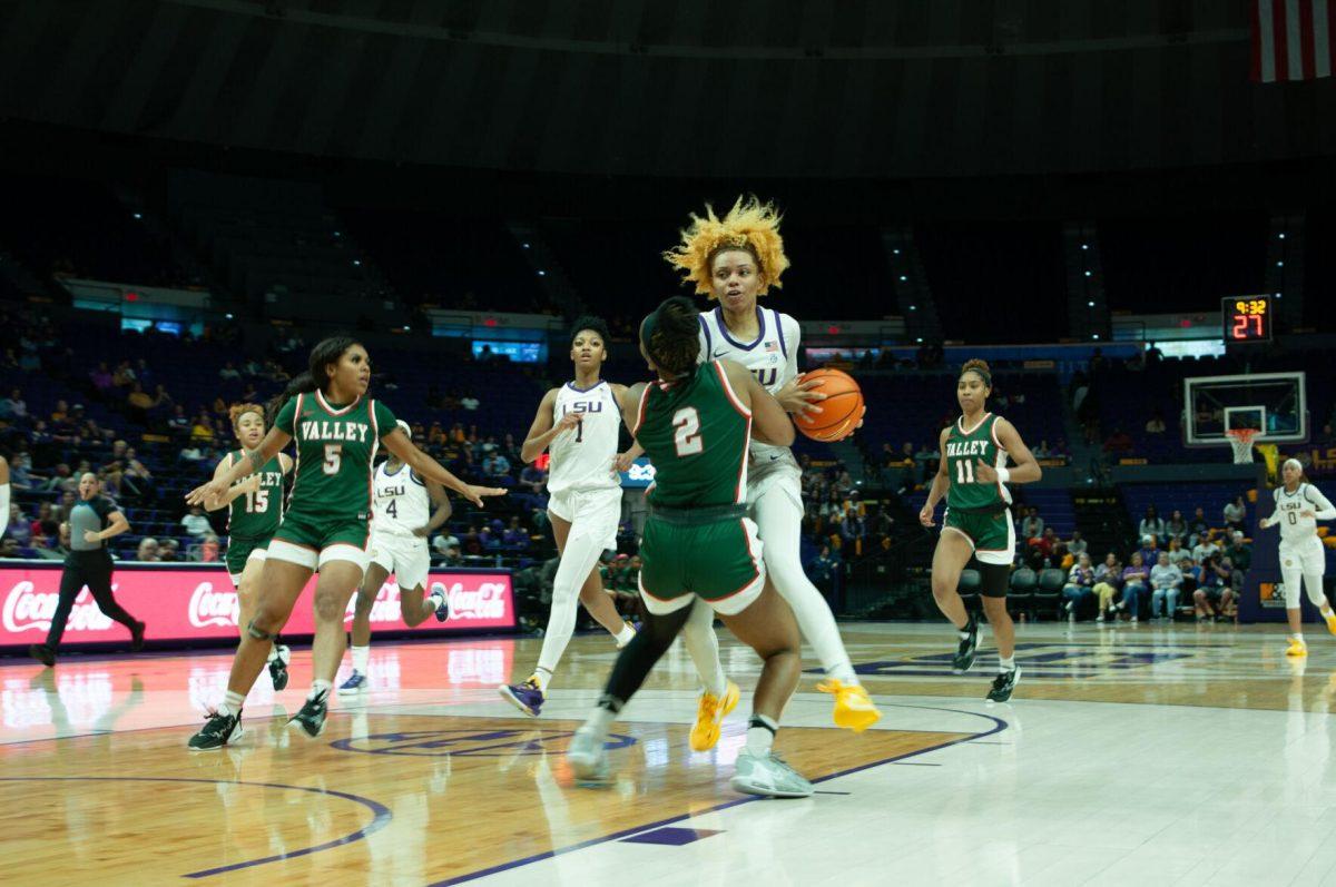 LSU women's basketball graduate student guard Jasmine Carson (2) charges against opponent and fellow guard Kyriana Jones during LSU's 111-41 victory over Mississippi Valley State on Friday, Nov. 11, 2022, at the Pete Maravich Assembly Center on N. Stadium Drive.