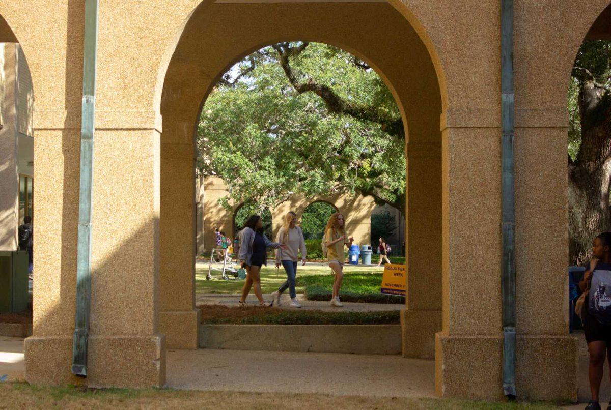 Three students walk together on Monday, Nov. 7, 2022, in the Quad in Baton Rouge, La.