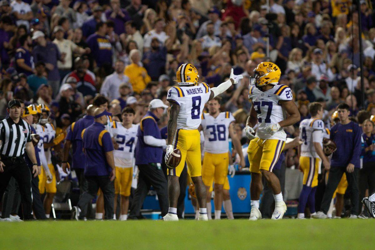 LSU football wide receiver Malik Nabers (8) points two fingers down the field after a play on Saturday, Nov. 5, 2022, during LSU&#8217;s 32-31 victory over Alabama in Tiger Stadium in Baton Rouge, La.