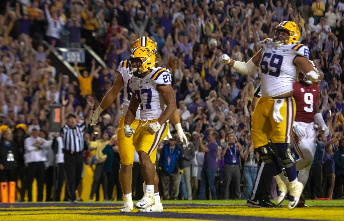 The LSU football offense celebrates a touchdown on Saturday, Nov. 5, 2022, during LSU&#8217;s 32-31 victory over Alabama in Tiger Stadium in Baton Rouge, La.