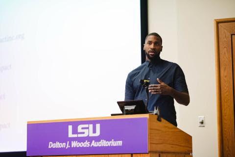 NBA player Michael Kidd-Gilchrist speaks to a class of students about the challenges that people face with stuttering (Photo courtesy of Abby Kibler)