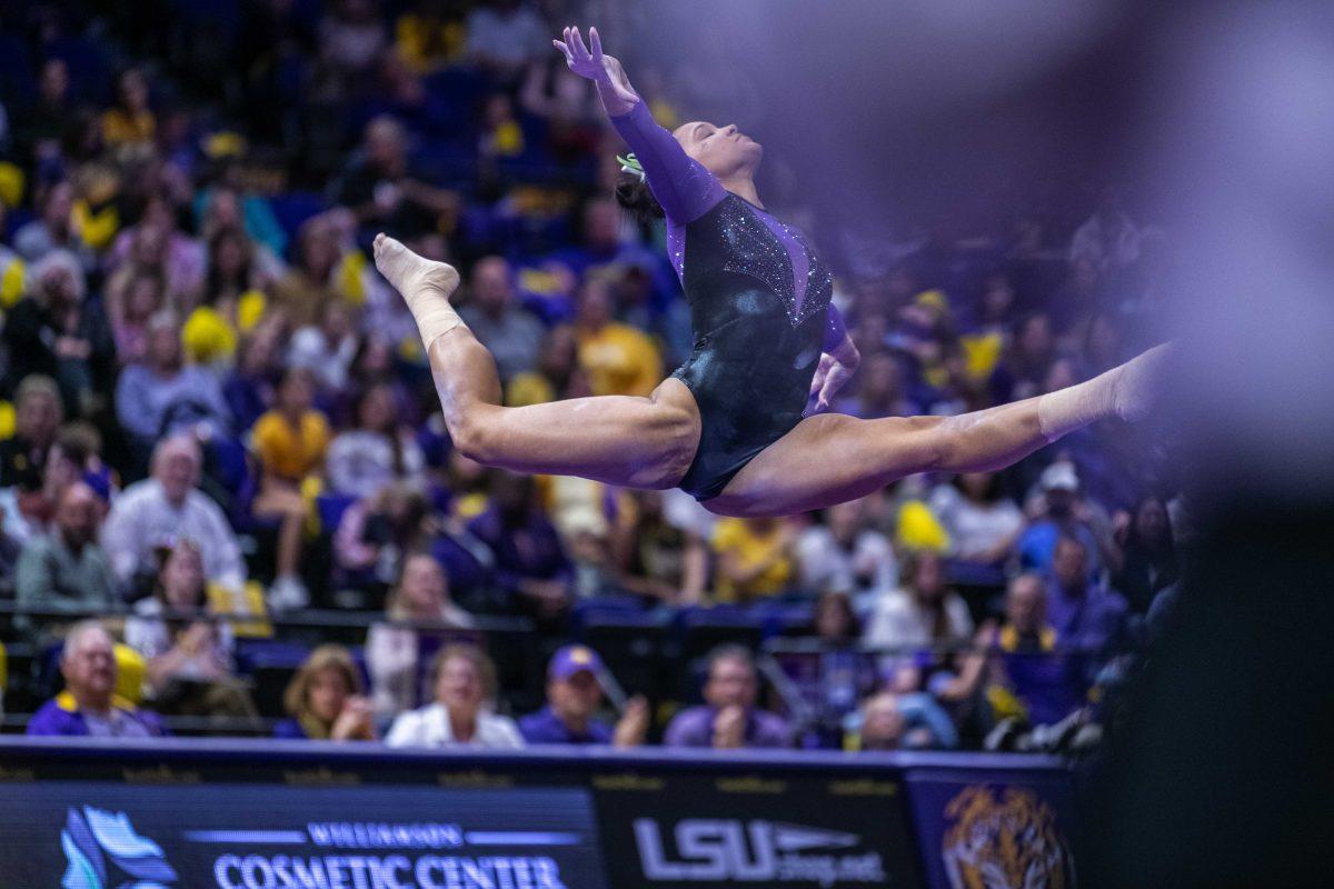 LSU gymnastics all-round sophomore Haleigh Bryant makes a leap Friday, March 11, 2022 during LSU's 198.125-197.875 win over University of Utah in the Pete Maravich Assembly Center on N. Stadium Drive in Baton Rouge, La.