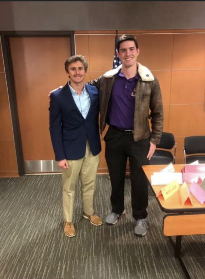 Patrick ONeil (project lead; left ) and Colin Raby (Region 9 SW Pres and Student Government Senator; right) after SG passed a bill allocating just under $2000 towards supporting the travel costs of the relief project.