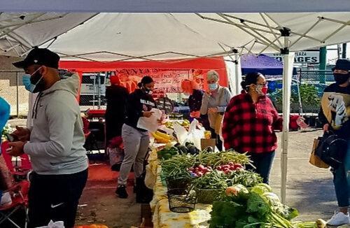 A vendor sells fresh fruit and vegetables at the Market at the Oasis at&#160;13827 Coursey Blvd. in&#160;Baton Rouge, La.