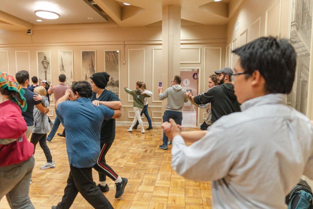 Dancers step to the music on Tuesday, Nov. 15, 2022, inside the LSU Student Union in Baton Rouge, La.