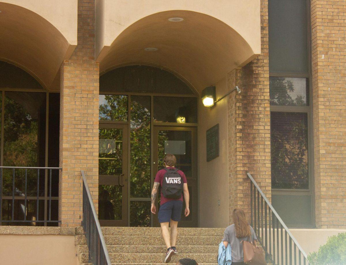 LSU students walk up the stairs on Monday, Nov. 7, 2022, into Lockett Hall in Baton Rouge, La.