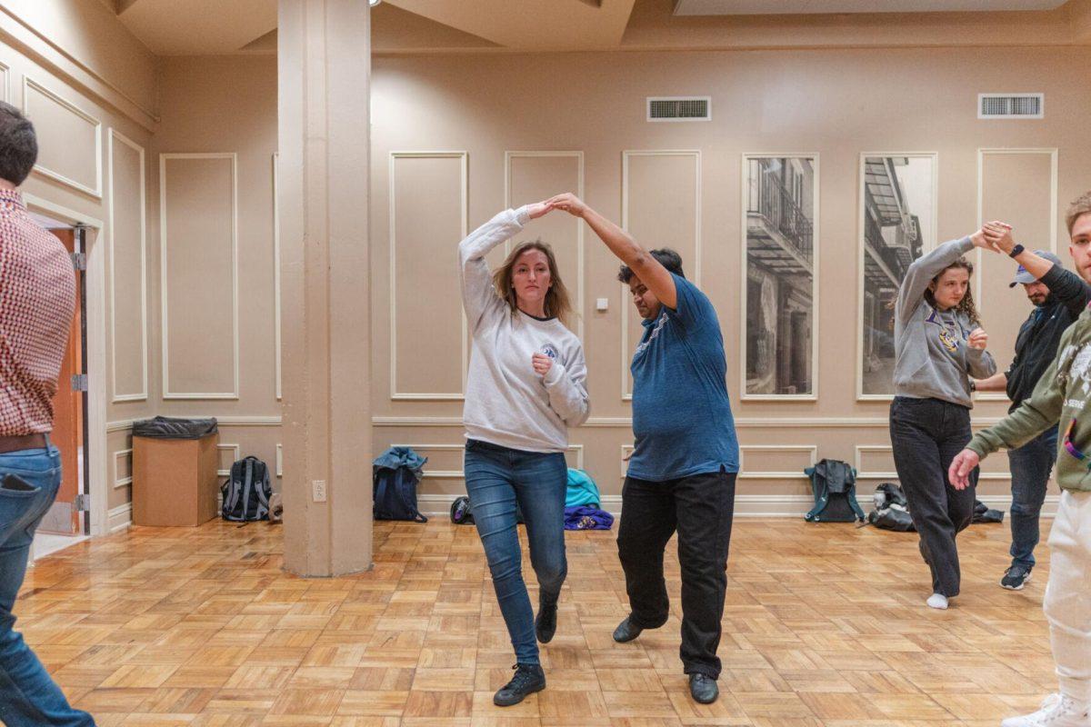 Dancers try a spin on Tuesday, Nov. 15, 2022, inside the LSU Student Union in Baton Rouge, La.