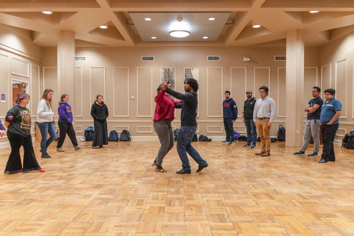 The LSU ballroom dance club instructors demonstrate dance moves on Tuesday, Nov. 15, 2022, inside the LSU Student Union in Baton Rouge, La.