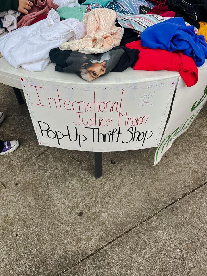 A poster reads "International Justice Mission Pop-Up Thrift Shop" on Wednesday, Nov. 16, 2022, outside of the LSU Student Union in Baton Rouge, La.