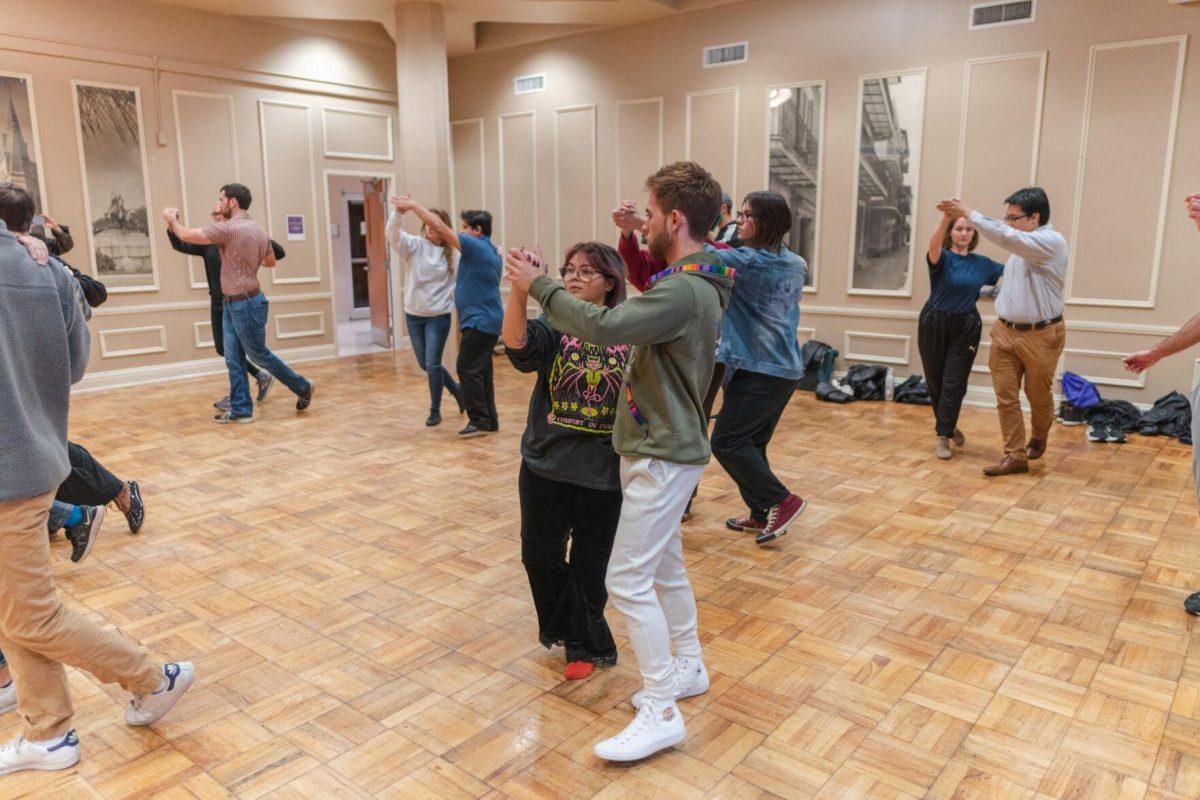 A pair of dancers practice their steps on Tuesday, Nov. 15, 2022, inside the LSU Student Union in Baton Rouge, La.