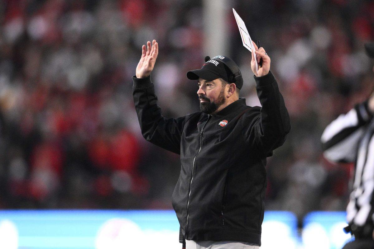 Ohio State head coach Ryan Day gestures during the first half of an NCAA college football game against Maryland, Saturday, Nov. 19, 2022, in College Park, Md. (AP Photo/Nick Wass)