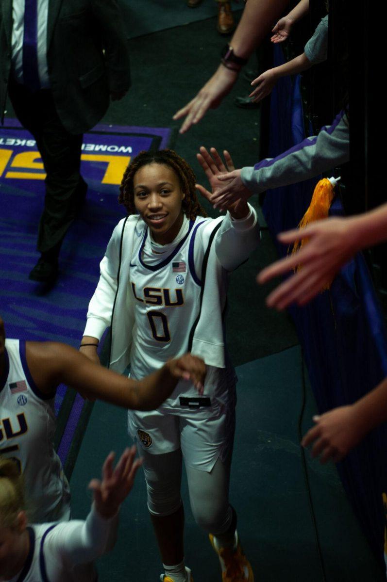 LSU women's basketball graduate student forward LaDazhia Williams (0) high fives fans on her way to the locker room after LSU's 111-41 victory over Mississippi Valley State on Friday, Nov. 11, 2022, at the Pete Maravich Assembly Center on N. Stadium Drive.