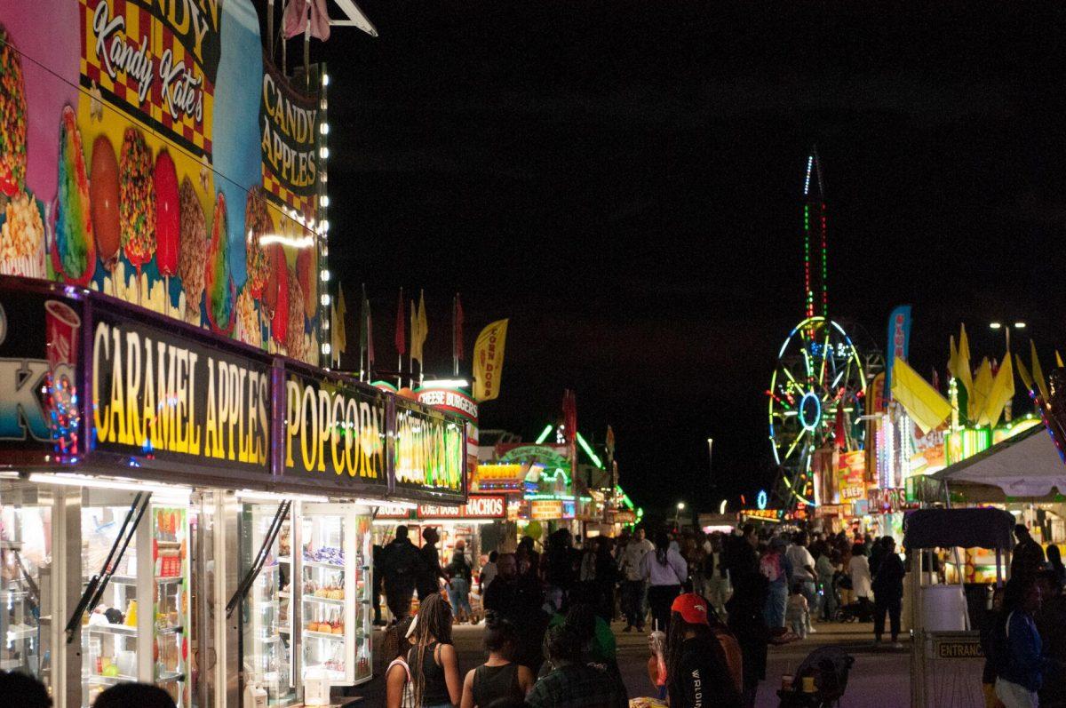 Neon lights from&#160;food vendors and rides illuminate the entrance area&#160;at the Greater Baton Rouge State Fair on Sunday, Oct. 30, 2022, at the Lamar Dixon Expo Center in Gonzales, La.