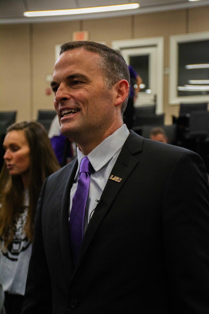 Matt McMahon talks to a reporter Wednesday, March 23, 2022, after the press conference held in regard to his recent hire as LSU basketball's new head coach at the Bill Lawton Room in Tiger Stadium in Baton Rouge, La.