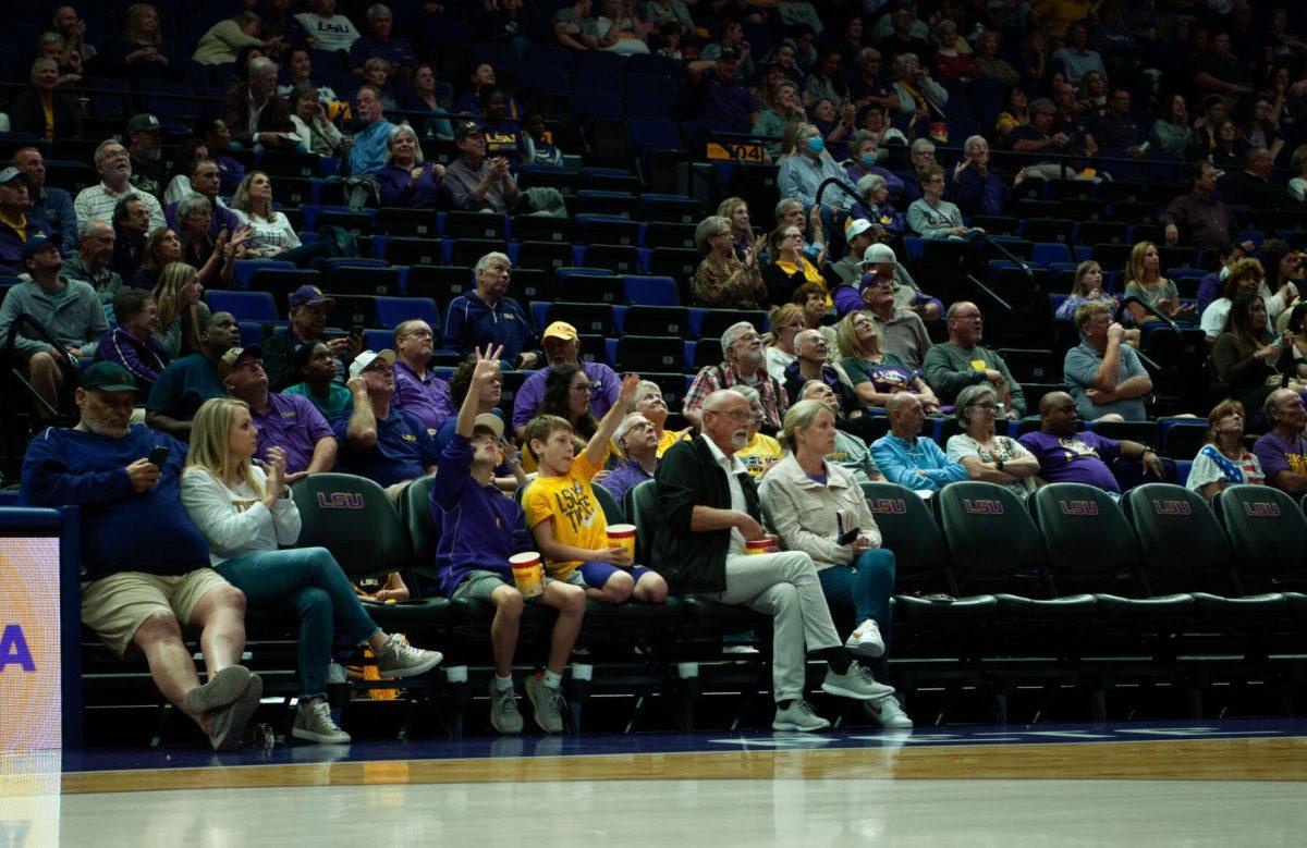 Two young court-side fans hold up their hands after a score during the LSU women's 111-41 victory over Mississippi Valley State on Friday, Nov. 11, 2022, at the Pete Maravich Assembly Center on N. Stadium Drive.