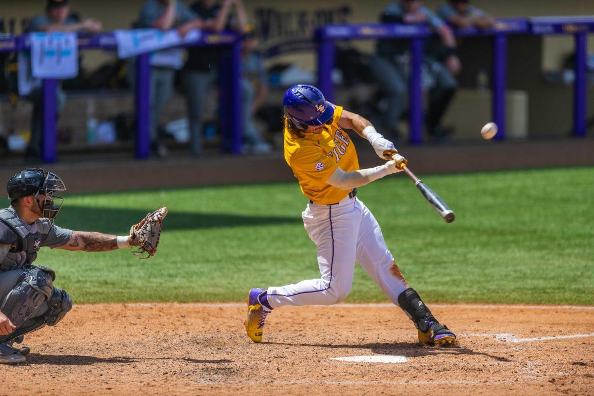 LSU baseball sophomore outfielder Dylan Crews (3) swings at the ball Saturday, April 23, 2022, during LSU's 8-6 win over Missouri at Alex Box Stadium.