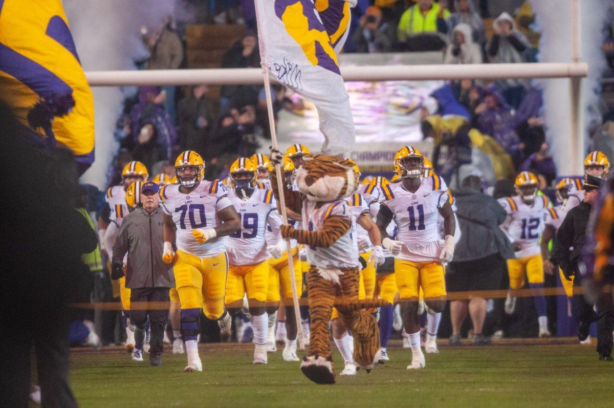 Mike the Tiger leads the LSU Football team onto the field on Saturday, Nov. 19, 2022, inside Tiger Stadium in Baton Rouge, La.