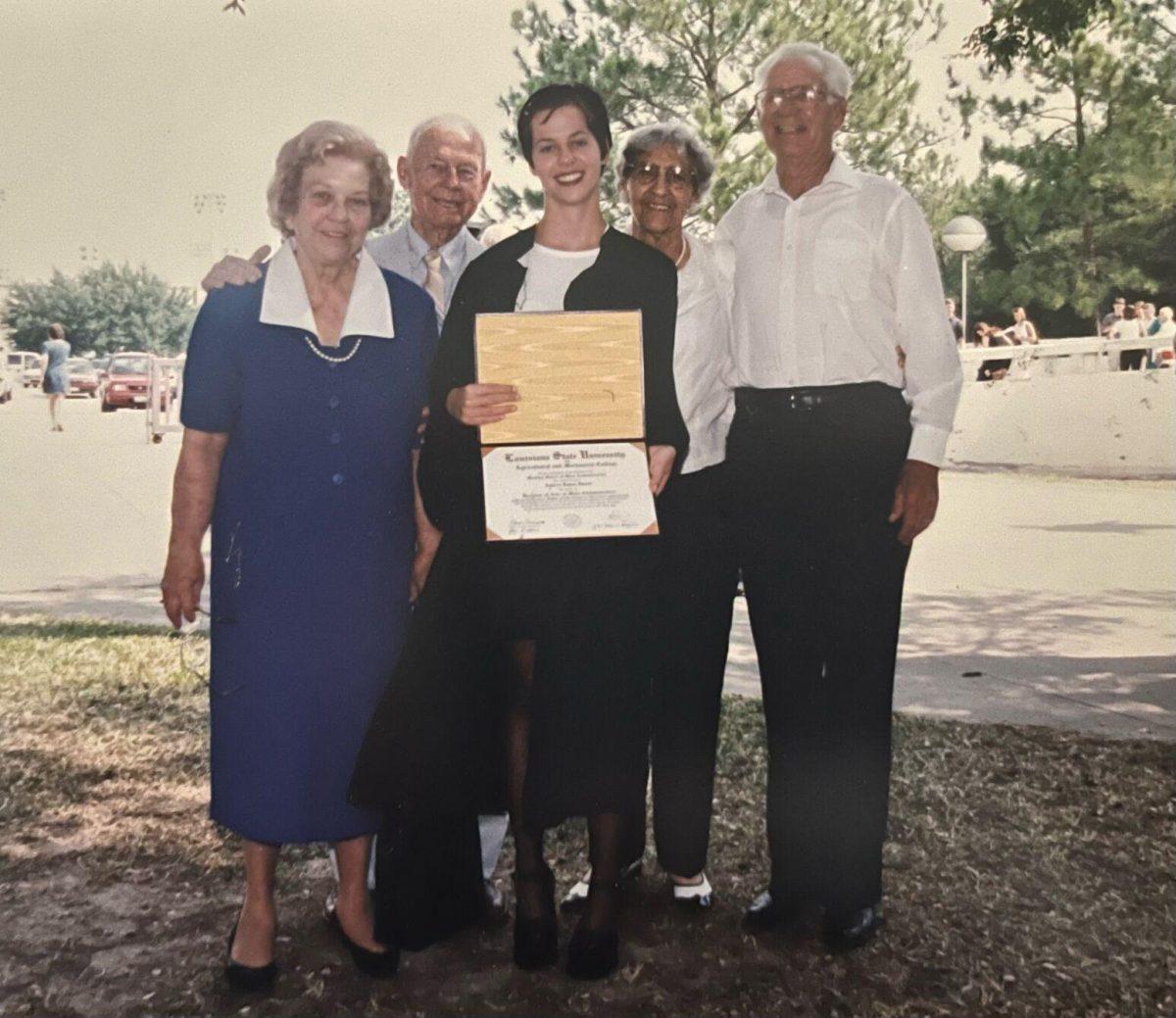 LSU alumna&#160;Andrea Weinbrecht poses for a picture with her family during her graduation in the summer of 1998. Fallon Joseph Weldon, Weinbrecht's poppie, (farthest right) was part of the LSU class of 1936.